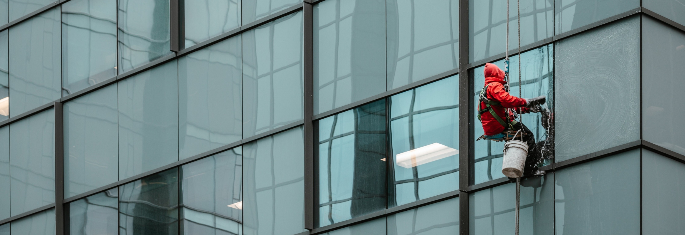 Washing Windows On A Rope